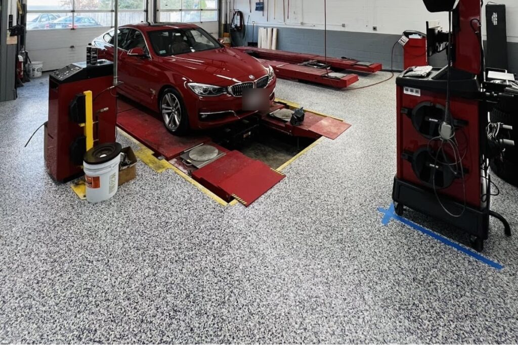 Cleaning oil off a non-porous epoxy auto shop floor